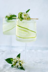 A refreshing white linen cocktail made with gin, cucumber, lemon juice, soda water and Elderflower Liqueur.