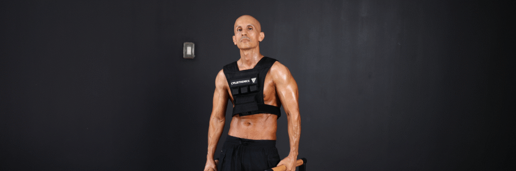 Frank Medrano posing with weight vest from GORNATION