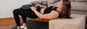 GORNATION athlete performs a glute bridge on the GORNATION Plyo Box
