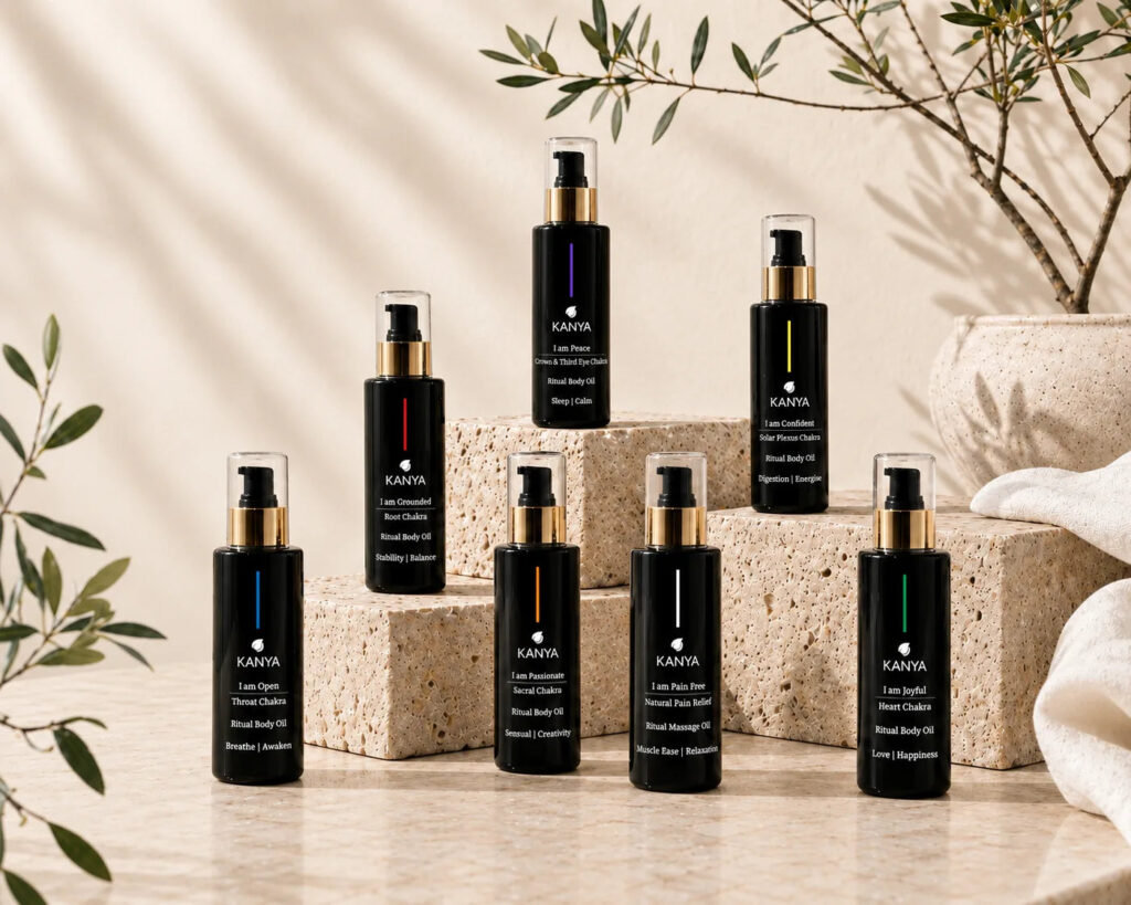 Kanya nourishing body oils in black glass bottles with gold pumps